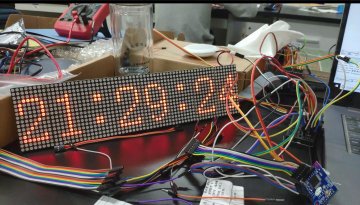 124+m069+基于单片机的多功能智能电子时钟设计